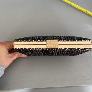 Small box clutch with chain.